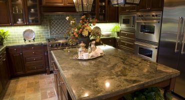 Modern Kitchen with brown tiles.