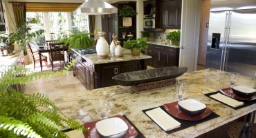 Luxury kitchen with a granite breakfast counter.